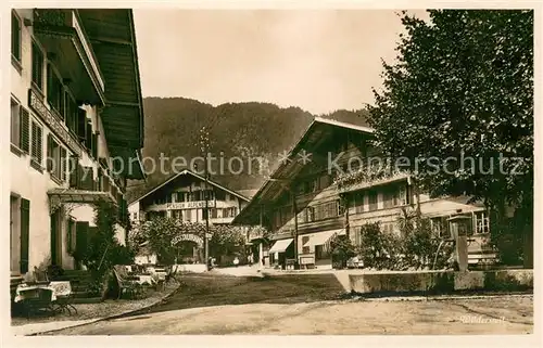AK / Ansichtskarte Wilderswil Ortspartie mit Brunnen Wilderswil