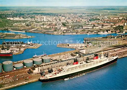 AK / Ansichtskarte Bremerhaven Fliegeraufnahme Passagierschiff France Columbusbahnhof Kaiserhafen Bremerhaven