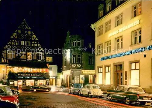 AK / Ansichtskarte Bad_Kissingen Alter Markt Fachwerk Gaststaette Bankgebaeude Nachtaufnahme Bad_Kissingen