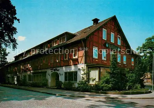 AK / Ansichtskarte Mueden_oertze Restaurant Hotel Zur Post Aussenansicht Bachsteinhaus Mueden oertze