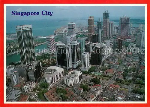 AK / Ansichtskarte Singapore Commercial and financial hub in the harbour city area aerial view Singapore