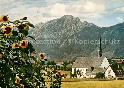 AK / Ansichtskarte Bayerisch_Gmain Sonnenblumen Ortsmotiv mit Kirche Hochstaufen Alpen Bayerisch Gmain