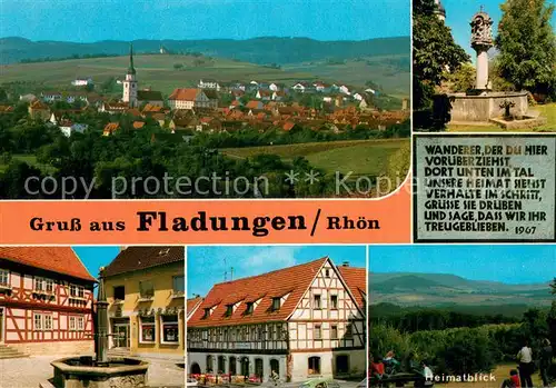 AK / Ansichtskarte Fladungen Ortsansicht mit Kirche Ortszentrum Fachwerkhaeuser Heimatblick Landschaftspanorama Fladungen