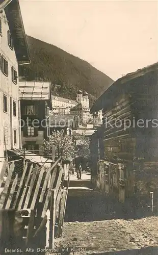 AK / Ansichtskarte Disentis_GR Alte Dorfgasse mit Kloster Disentis GR
