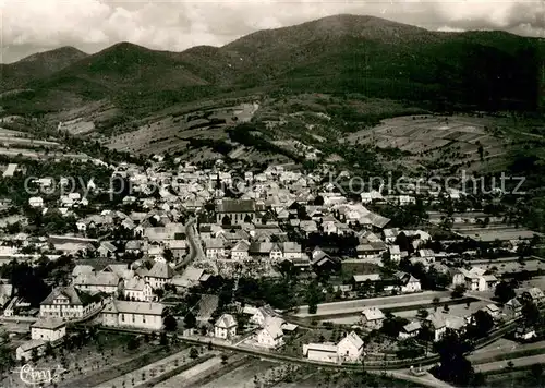 AK / Ansichtskarte Uffholtz Vue generale aerienne En arrier plan la Chaine des Vosges Uffholtz