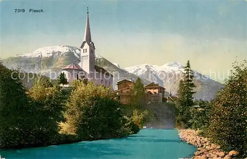 AK / Ansichtskarte Fiesch Dorfansicht mit Kirche Partie am Fluss Alpen Fiesch