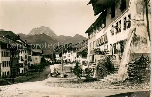 AK / Ansichtskarte Gruyeres__Gruyere_FR La rue 
