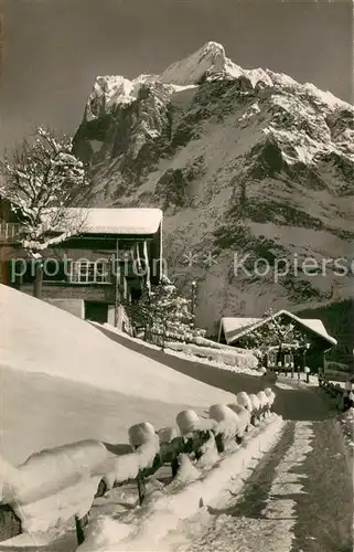 AK / Ansichtskarte Grindelwald Ortspartie mit Wetterhorn Feldpost Grindelwald