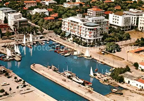 AK / Ansichtskarte Riccione_Italia Dock mit Savioli Hotel Strandpartie Fliegeraufnahme 