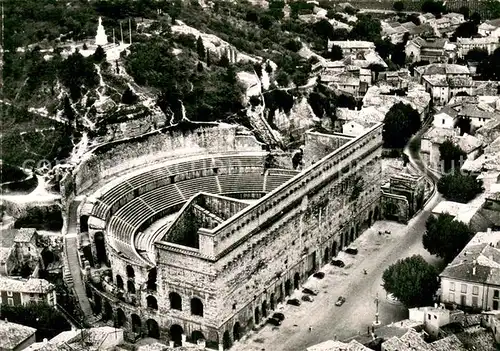 AK / Ansichtskarte Orange_84 Vue aerienne sur le Theatre Antique et son Mur Monumental et la Vierge de la Colline Saint Eutrope 