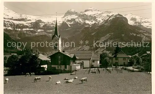 AK / Ansichtskarte Lenk_Simmental Kirche mit Wildstrubel Lenk Simmental