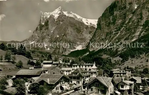 AK / Ansichtskarte Grindelwald Dorfpartie mit Wetterhorn Grindelwald