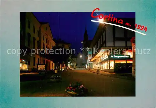 AK / Ansichtskarte Cortina_d_Ampezzo Ortspartie bei Nacht Cortina_d_Ampezzo