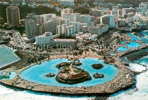 AK / Ansichtskarte Puerto de la Cruz Vista aerea Lago Martianez y Hoteles 