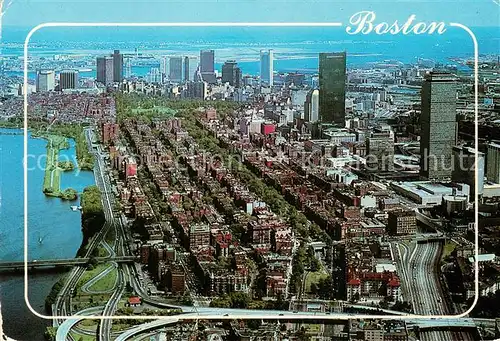 AK / Ansichtskarte Boston_Massachusetts Back Bays low brick buildings Skyscrapers Downtown aerial view 