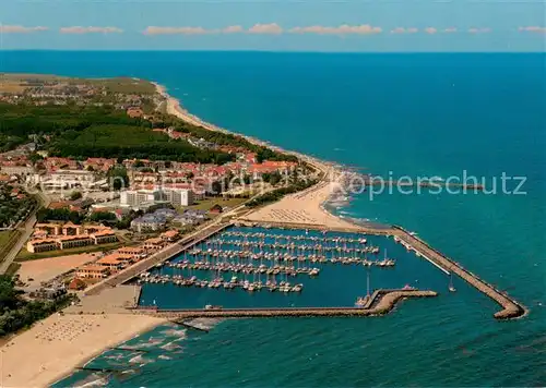 AK / Ansichtskarte Kuehlungsborn_Ostseebad Stadtteil Ost mit Yachthafen und Seebruecke Fliegeraufnahme Kuehlungsborn_Ostseebad