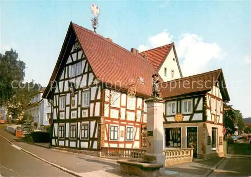 AK / Ansichtskarte Bad_Orb Kunst und Antiquitaetenhaus Der Tintenfisch mit Wendelinusbrunnen Bad_Orb