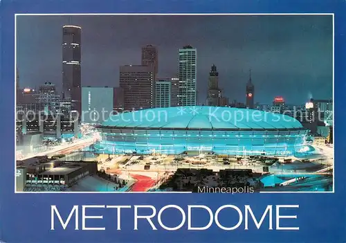 AK / Ansichtskarte Minneapolis_Minnesota Skyline at night with Hubert H. Humphrey Metrodome 