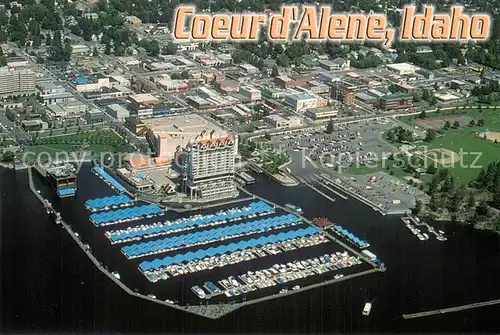AK / Ansichtskarte Coeur_d_Alene_Idaho Fliegeraufnahme Resort and Downtown area along Coeur dAlene Lakes north shore 