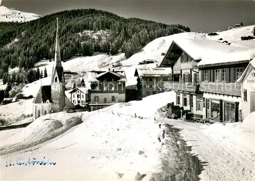 AK / Ansichtskarte St_Antoenien_GR Dorfpartie im Schnee geg. d. Kreuz St_Antoenien_GR