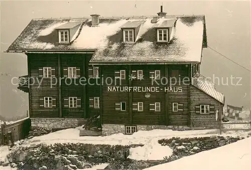 AK / Ansichtskarte Feuerkogelhuette_AT Naturfreundehaus Aussenansicht im Schnee 