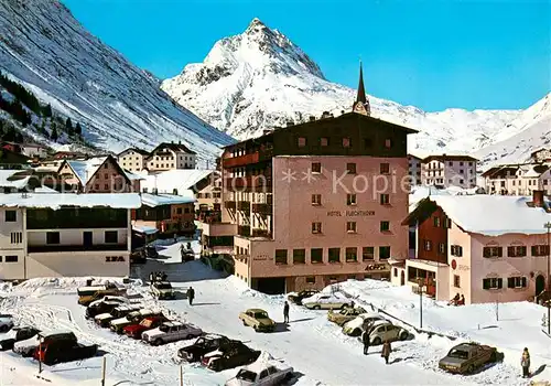 AK / Ansichtskarte Galtuer_Tirol Dorfansicht im Schnee m. Hotel Fluchthorn Galtuer Tirol