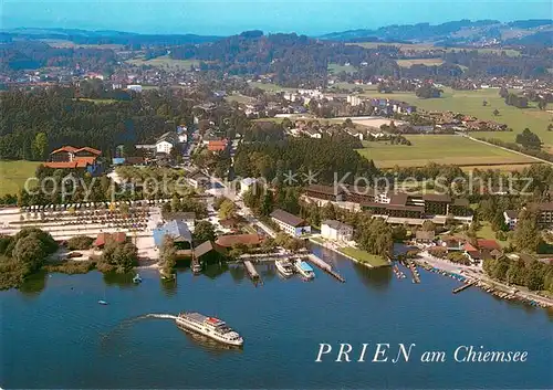 AK / Ansichtskarte Prien_Chiemsee Dampferhafen und Schiffsanlegestelle Fliegeraufnahme Prien Chiemsee