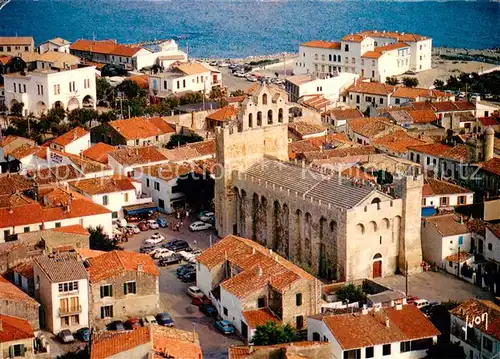 AK / Ansichtskarte Les_Saintes Maries de la Mer Eglise fortifiee Vue aerienne Les