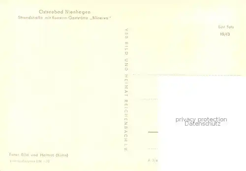 AK / Ansichtskarte Nienhagen_Ostseebad Strandstrasse mit Konsum Gaststaette Minerva Nienhagen_Ostseebad