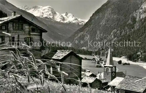 AK / Ansichtskarte Randa_VS Bergdorf Ansicht mit Kirche Blick zum Breithorn Walliser Alpen 