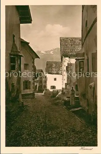 AK / Ansichtskarte Guarda_GR Ortsmotiv Gasse 