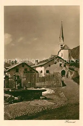 AK / Ansichtskarte Zernez_GR Ortspartie mit Kirche Zernez_GR