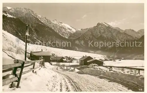 AK / Ansichtskarte Hinterstein_Bad_Hindelang Ortsstrasse Winterpanorama Allgaeuer Alpen Hinterstein_Bad_Hindelang
