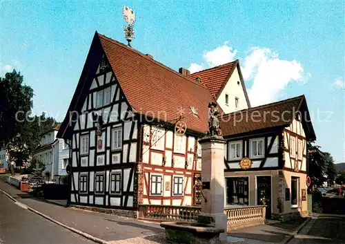 AK / Ansichtskarte Bad_Orb Antik Kunstgeschaeft Fachwerkhaus am Wendelinusbrunnen Bad_Orb