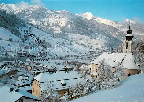AK / Ansichtskarte Grossarl_AT Ortsansicht mit Kirche Winterlandschaft Alpen 