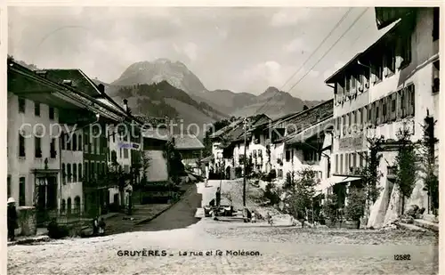 AK / Ansichtskarte Gruyeres__Gruyere_FR La rue et le Moleson 