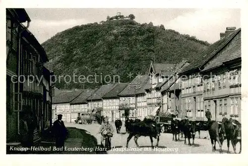 AK / Ansichtskarte Bad_Lauterberg Hauptstrasse m. Hausberg Kuhherde Bad_Lauterberg