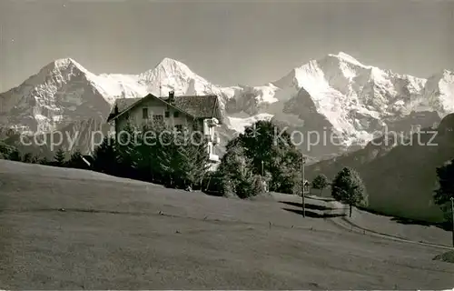 AK / Ansichtskarte Beatenberg_BE Hotel Amisbuehl Aussenansicht m. Eiger Moench Jungfrau 