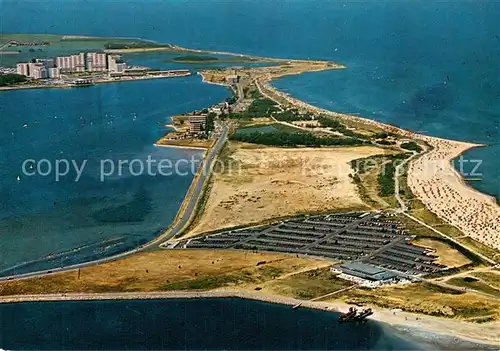 AK / Ansichtskarte Heiligenhafen_Ostseebad Binnensee Halbinsel Steinwarder und Ferienzentrum Fliegeraufnahme Heiligenhafen_Ostseebad