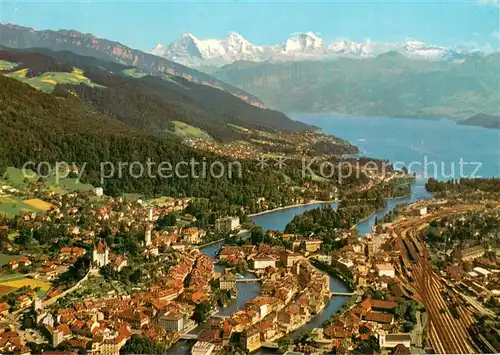 AK / Ansichtskarte Thun_BE Fliegeraufnahme mit Eiger Moench und Jungfrau Thun_BE
