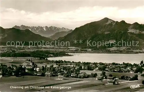 AK / Ansichtskarte Chieming_Chiemsee Fliegeraufnahme mit Kaisergebirge Chieming Chiemsee