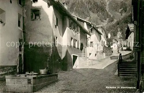 AK / Ansichtskarte Pontresina Strasse Gasse Brunnen Pontresina