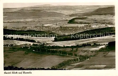 AK / Ansichtskarte Hameln_Weser Fliegeraufnahme Blick Suentelturm Hameln Gesamtansicht Hameln Weser