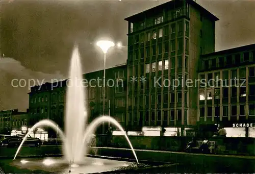 AK / Ansichtskarte Bad_Homburg Hochhaus m. Springbrunnen bei Nacht Bad_Homburg