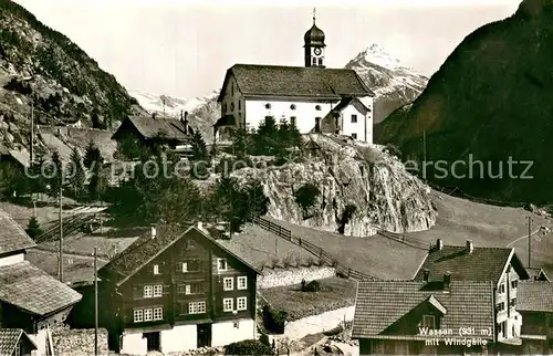 AK / Ansichtskarte Wassen_UR mit Windgaelle und Kirche Wassen_UR