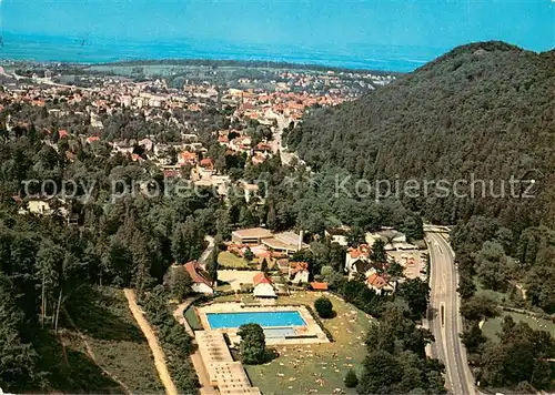 AK / Ansichtskarte Bad_Harzburg Fliegeraufnahme mit Freibad Juliusbad Kuranlagen Burgberg und Seilbahn Bad_Harzburg