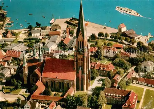 AK / Ansichtskarte Schleswig_Schlei Fliegeraufnahme mit Kirche Schleswig_Schlei