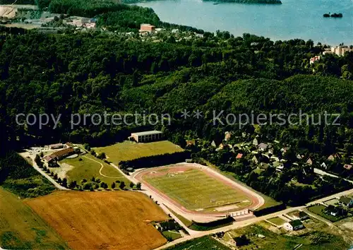 AK / Ansichtskarte Malente Gremsmuehlen Fliegeraufnahme mit Sportplatz Malente Gremsmuehlen