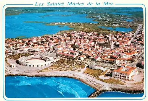 AK / Ansichtskarte Les_Saintes Maries de la Mer Vue aerienne La ville les Arenes lEglise les etangs Les