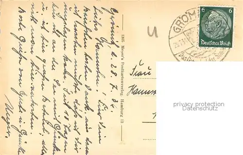 AK / Ansichtskarte Groemitz_Ostseebad Strand mit Landungsbruecke Groemitz_Ostseebad